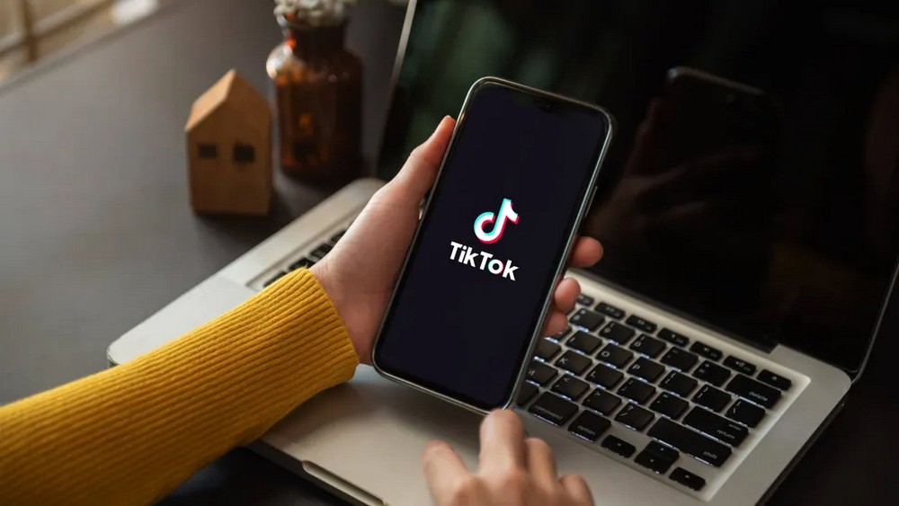 Closed up image of a Female using TikTok application on a smartphone in home.17 November, 2022. ChiangMai, Thailand.